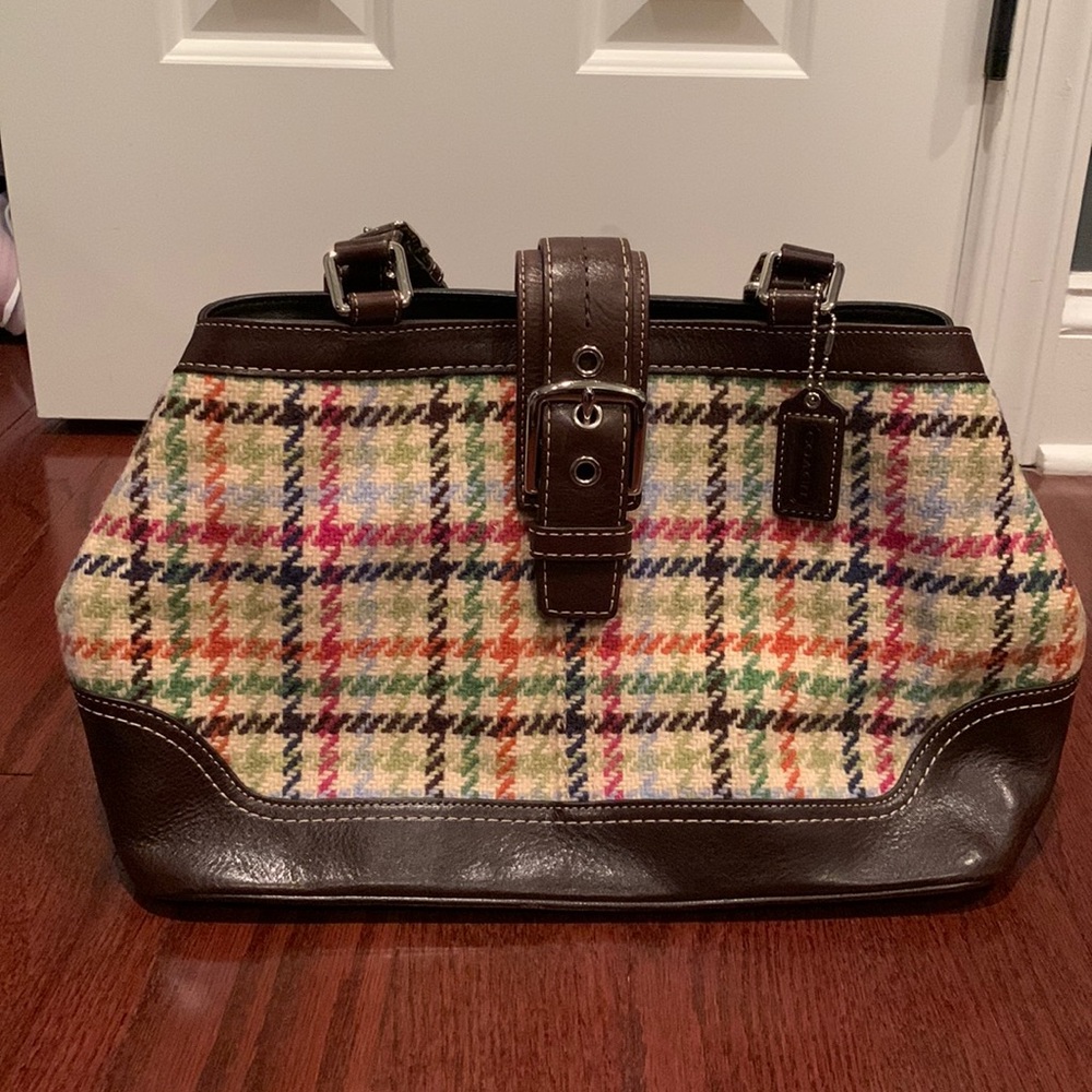 Beautiful patterned signature Coach purse with brown leather trim
